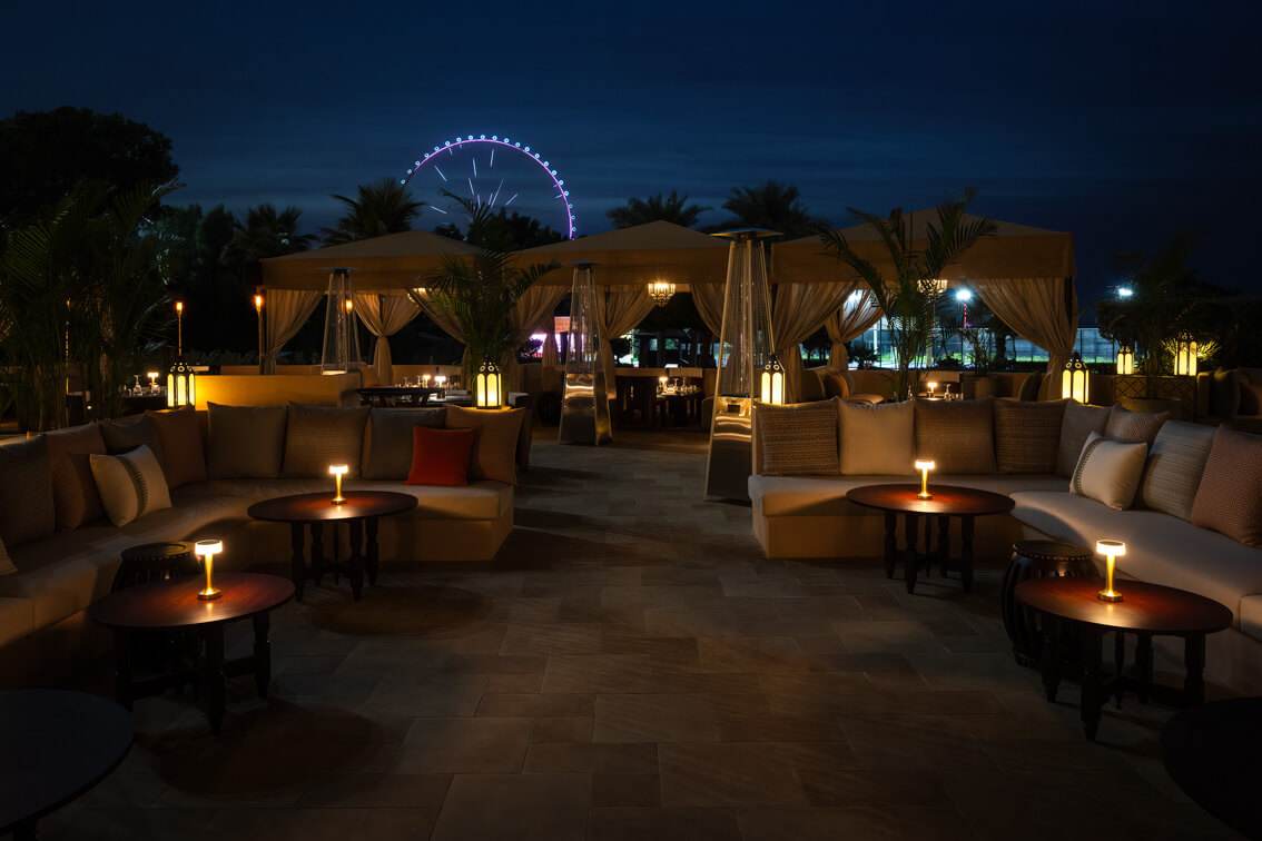 outdoor night restaurant Amaseena at The Ritz-Carlton, JBR by DZ Design